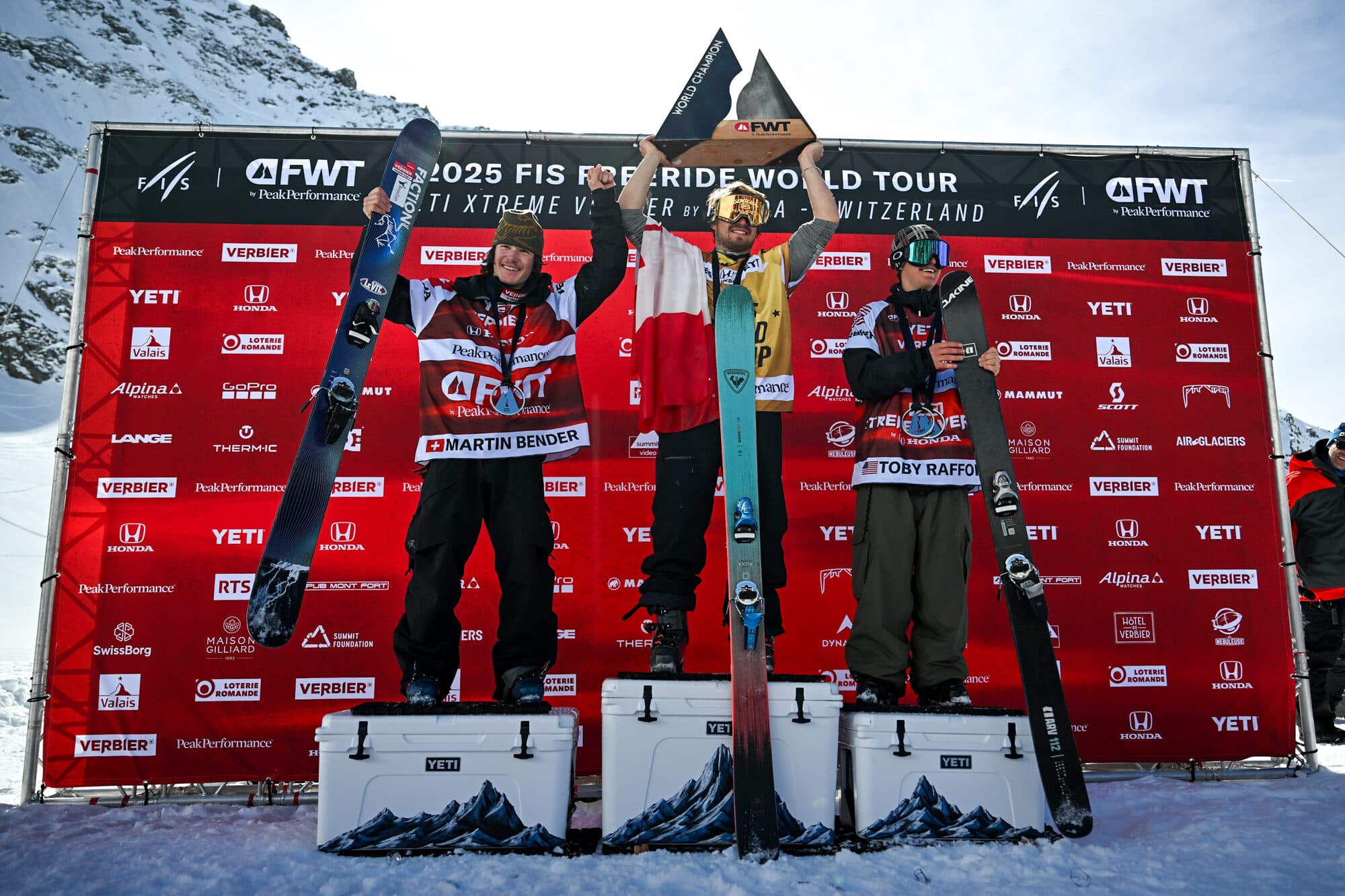 Marcus on the top step of the 2025 Freeride World Tour overall podium in Verbier, holding his skis